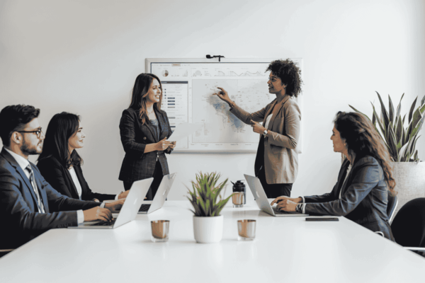Buyer and seller reviewing customer transferability during a business acquisition