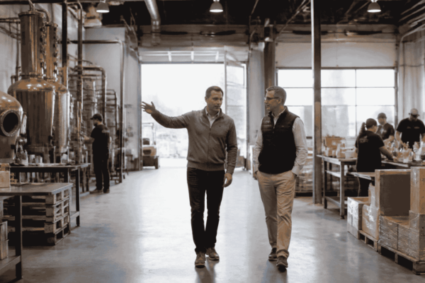Founder walking through company operations while preparing for outside capital or buyer conversations