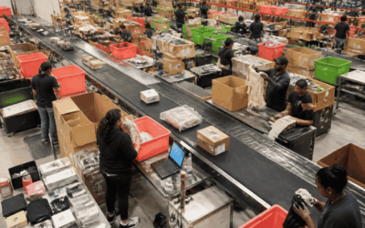 Retail employees sorting returned products for restocking, refurbishment, and recycling