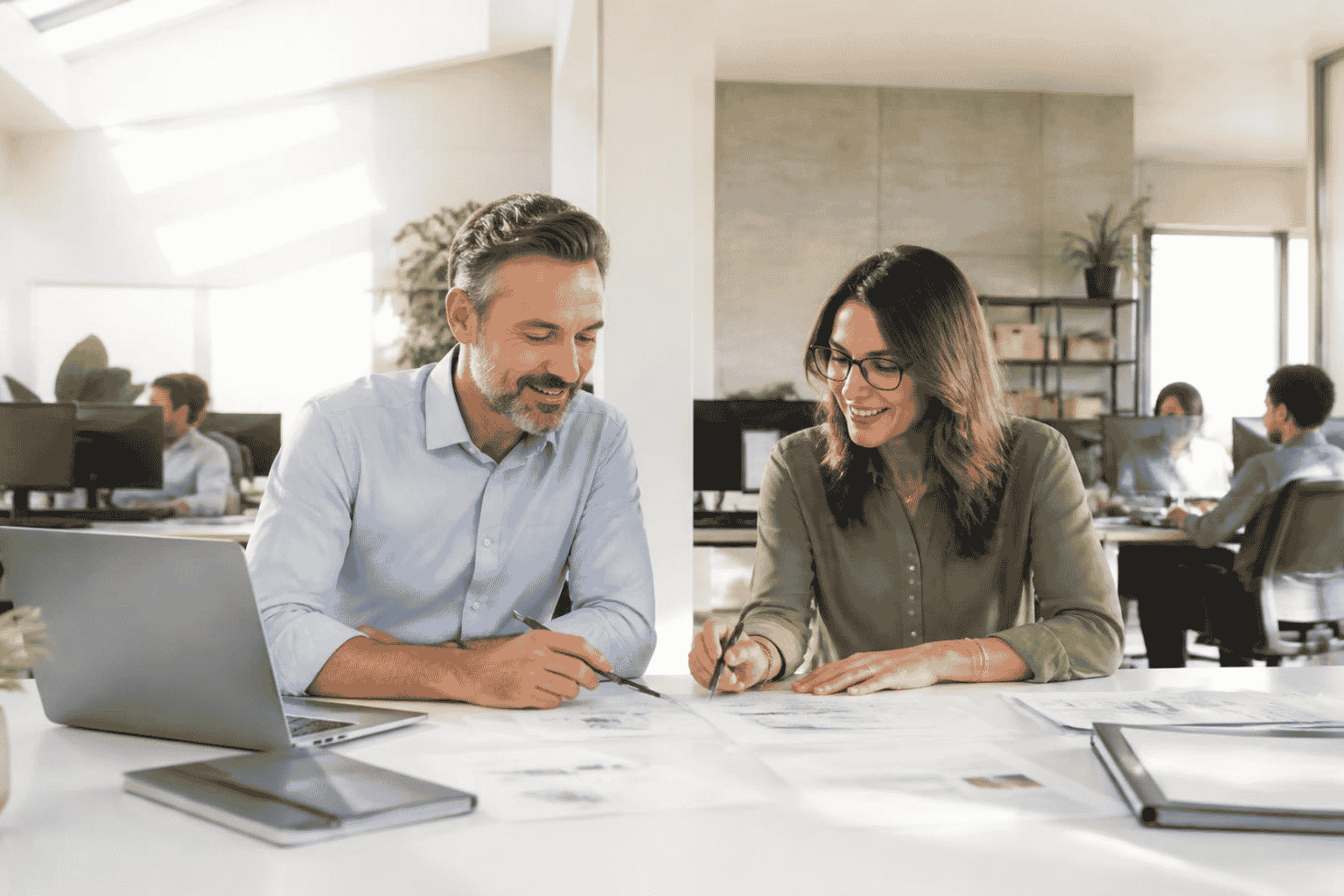 Business owner reviewing technology upgrade financing documents with a funding advisor