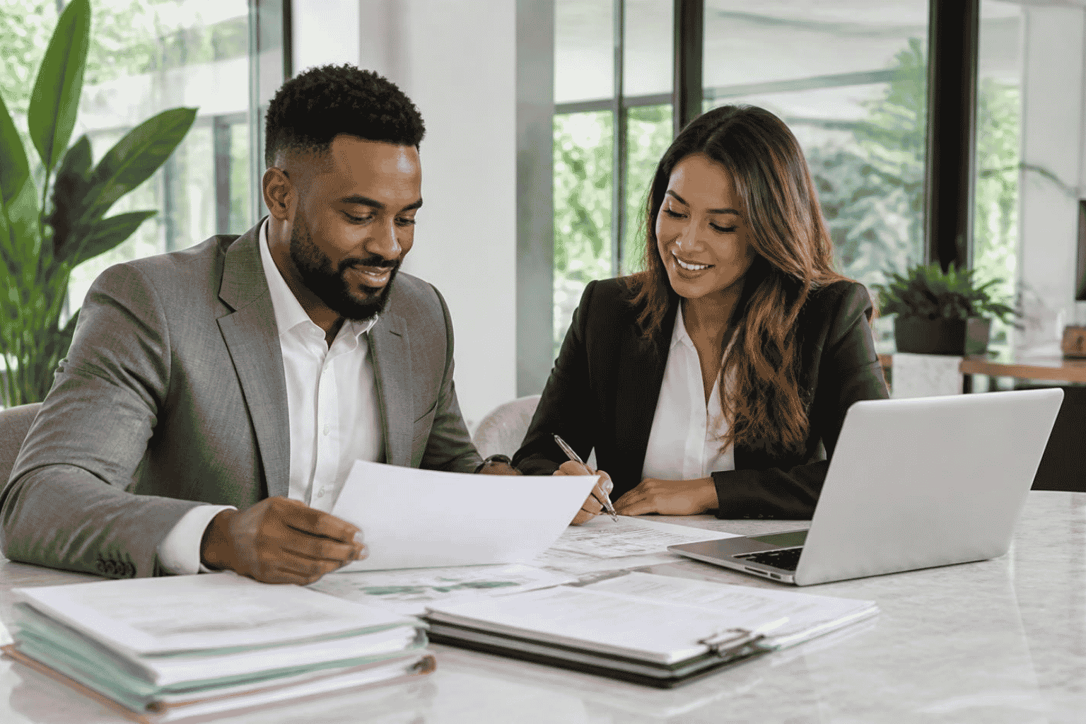 Business owner organizing a lender-ready funding profile with a funding advisor