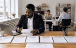 Business owner preparing information required for a business funding application and pre qualification