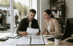 Business owner preparing credit revenue deposits debt and use of funds before applying for financing