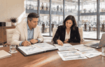 Business buyer reviewing existing company debt before seeking an acquisition loan